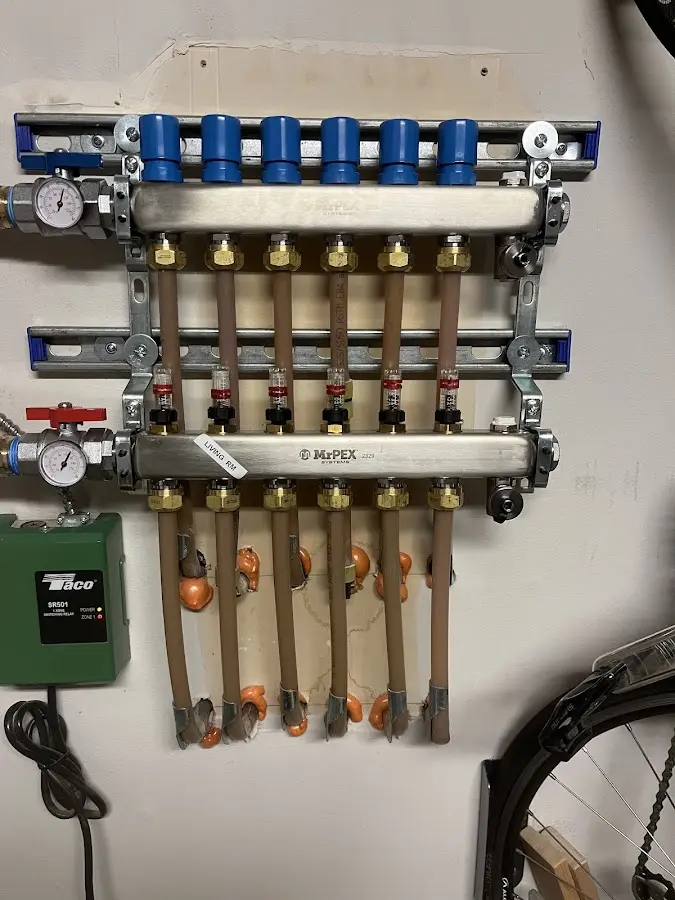 Plumber performing Water Heater Repair at a residential property in Cibolo